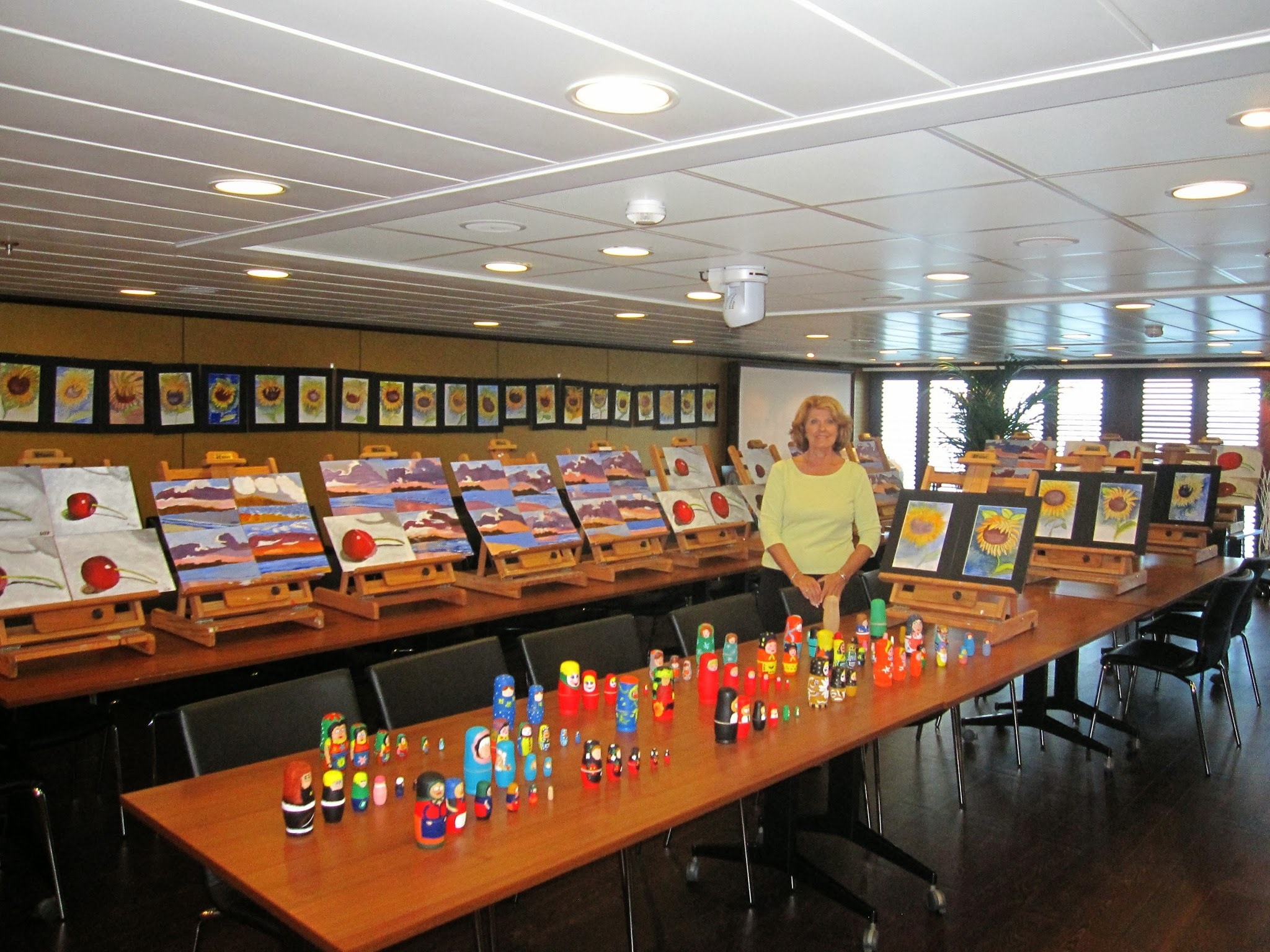 Artists sharing paintings during an art class